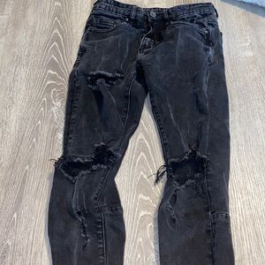 Black denim jeans with zippers at ankles size 28